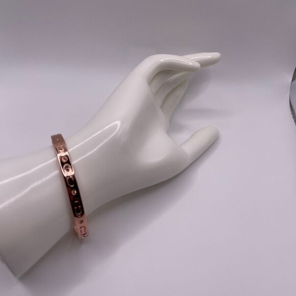 COACH Women's Rose Gold Kissing C Logo Signature Hinged Crystal Bangle Bracelet - Picture 7 of 12